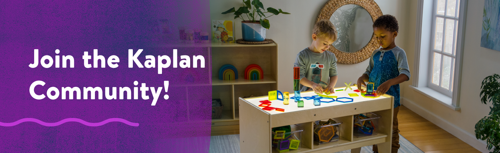 Join the Kaplan Community! Image of two children playing on a light table.